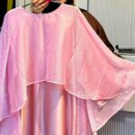 Stone Organza Armani Silk Borka. Woman showcasing a pink stone organza Armani silk borka with elegant layered design.